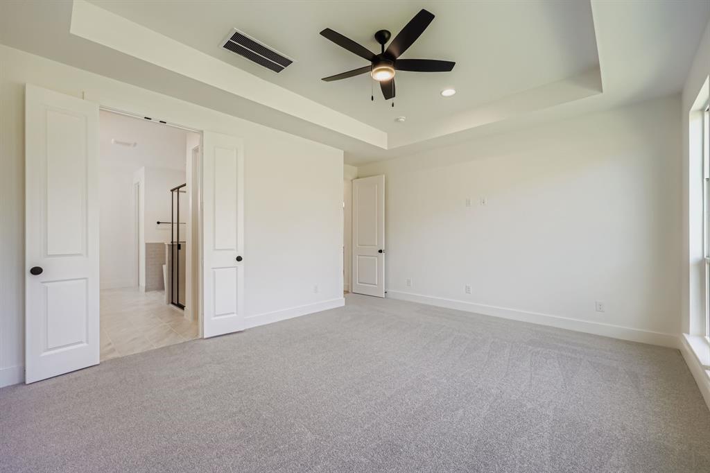 1841 Pk Vista Way Midlothian, TX 76065 - Photo 11 of 28 an empty room with a ceiling fan and a window