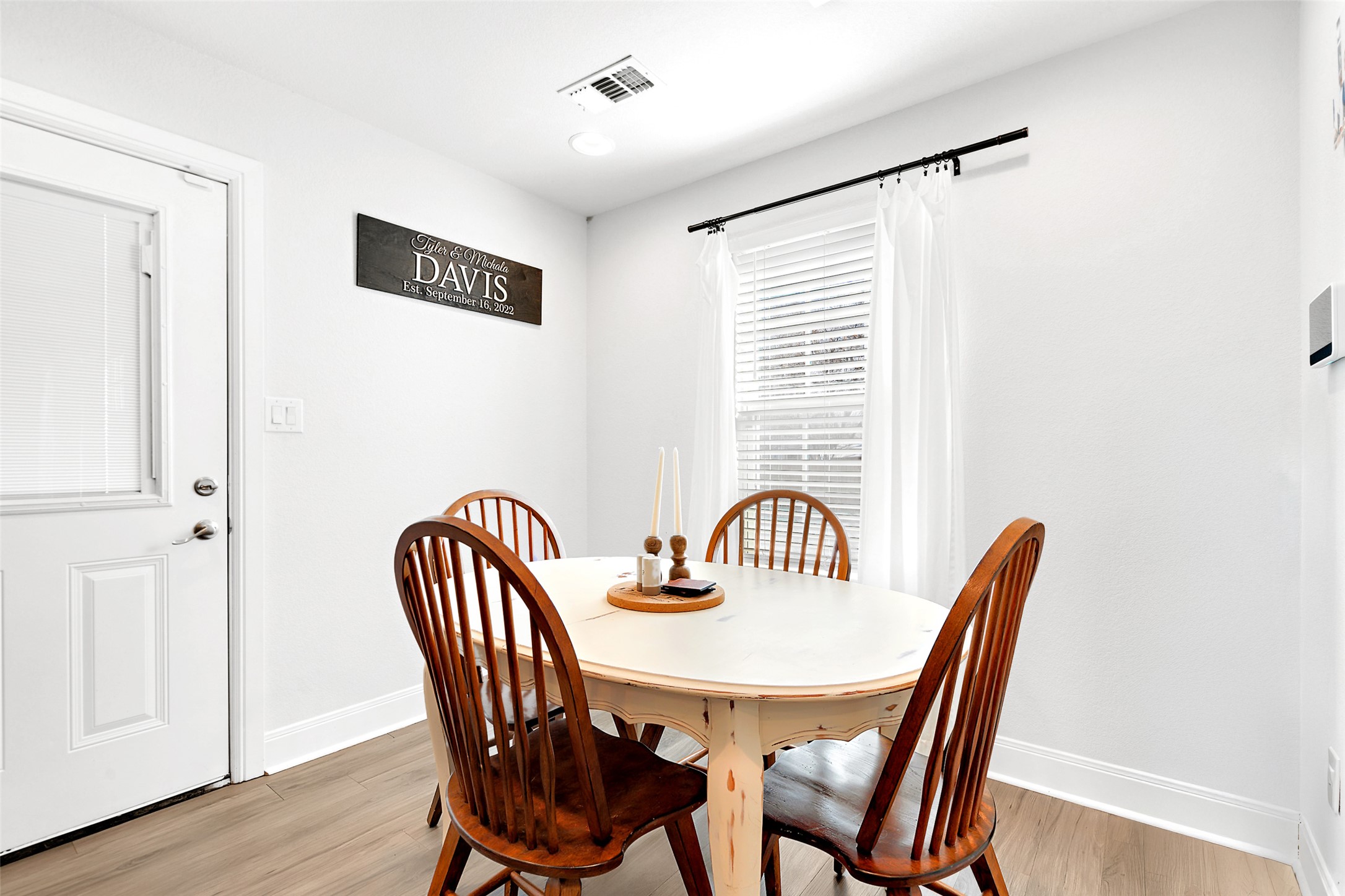 602 South Pierce Street Burnet, TX 78611 - Photo 10 of 29 a view of a dining room with furniture window and wooden floor