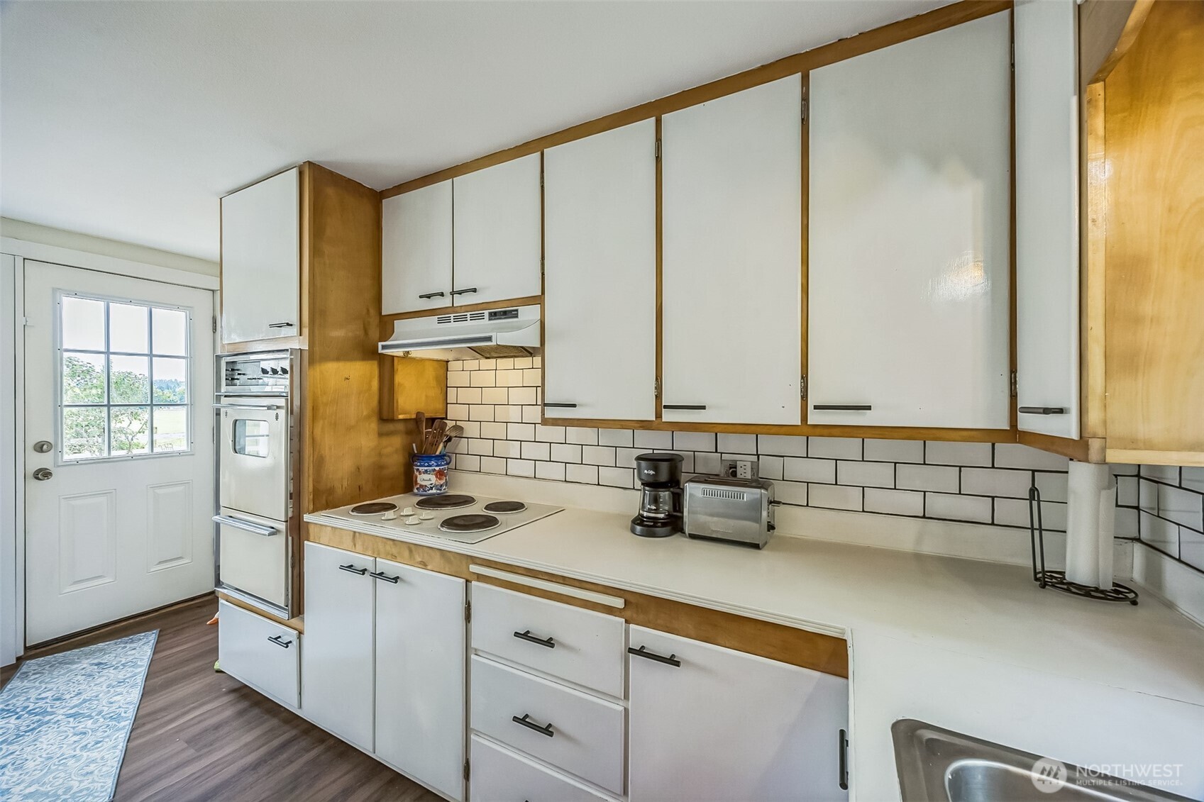 143 Mauerman Road Chehalis, WA 98532 - Photo 21 of 31 a kitchen with sink cabinets and window