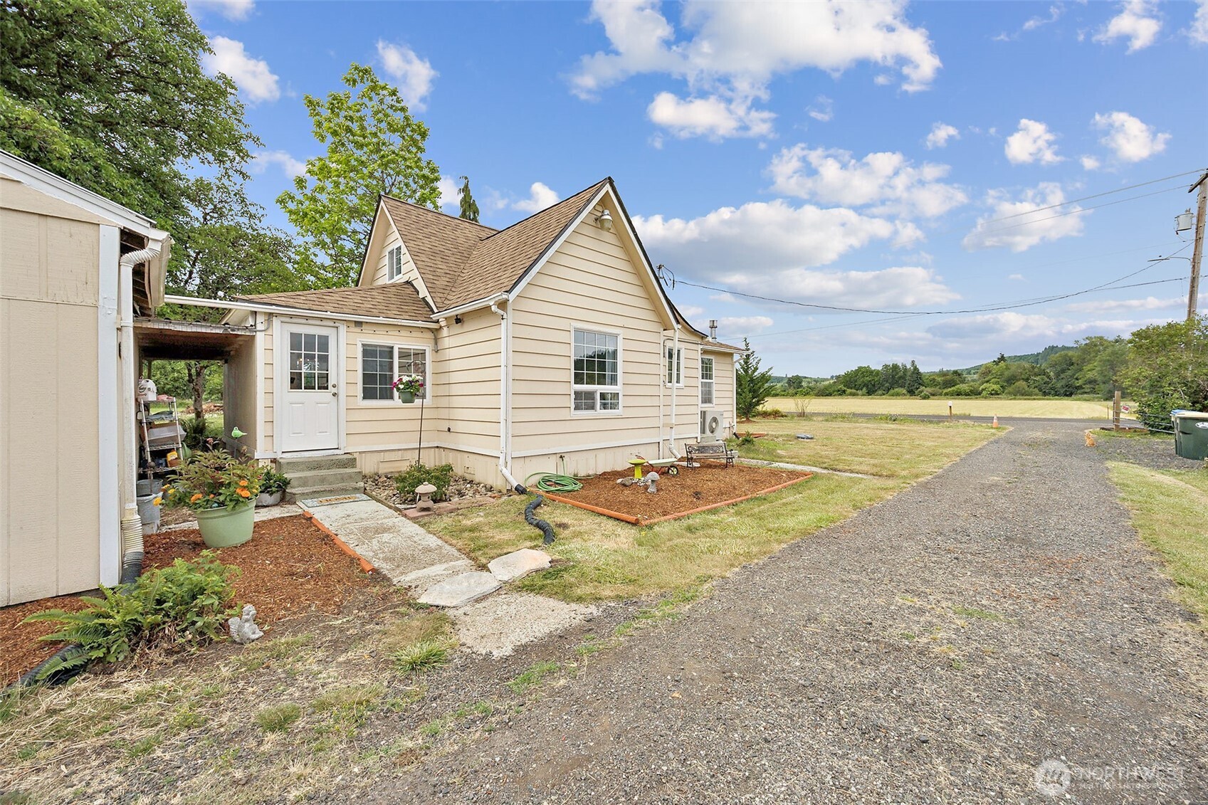 143 Mauerman Road Chehalis, WA 98532 - Photo 31 of 31 a view of a house with backyard and sitting area