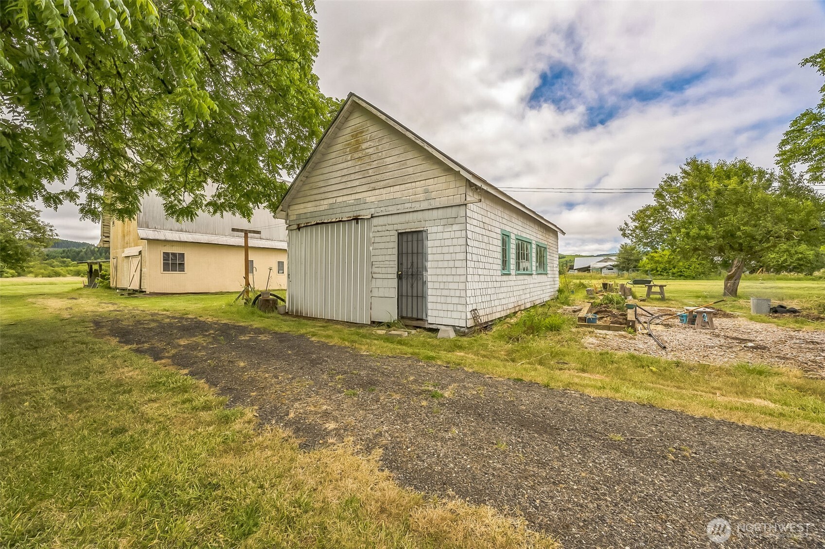 143 Mauerman Road Chehalis, WA 98532 - Photo 7 of 31 a view of a house with a yard and garage