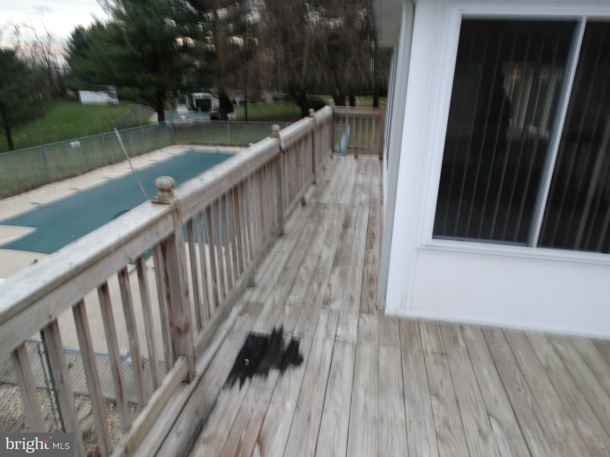 3701 Basford Road Frederick, MD 21703 - Photo 8 of 30 a view of balcony with wooden floor and fence