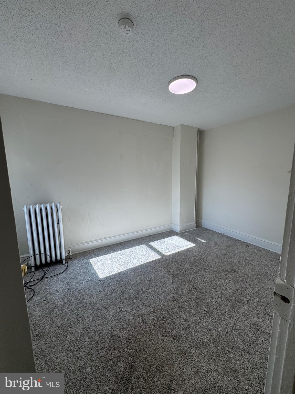 646 1st Street Lancaster, PA 17603 - Photo 9 of 25 an empty room with staircase