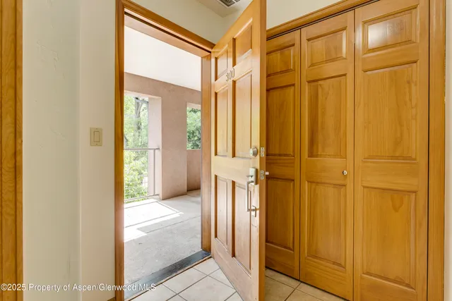 a view of a bathroom with a glass door