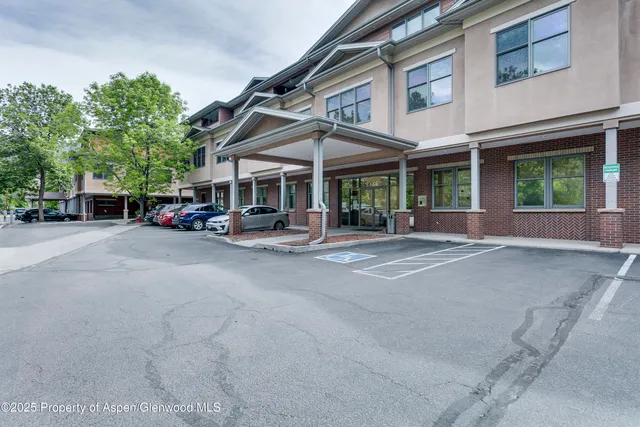 a view of a building with a patio