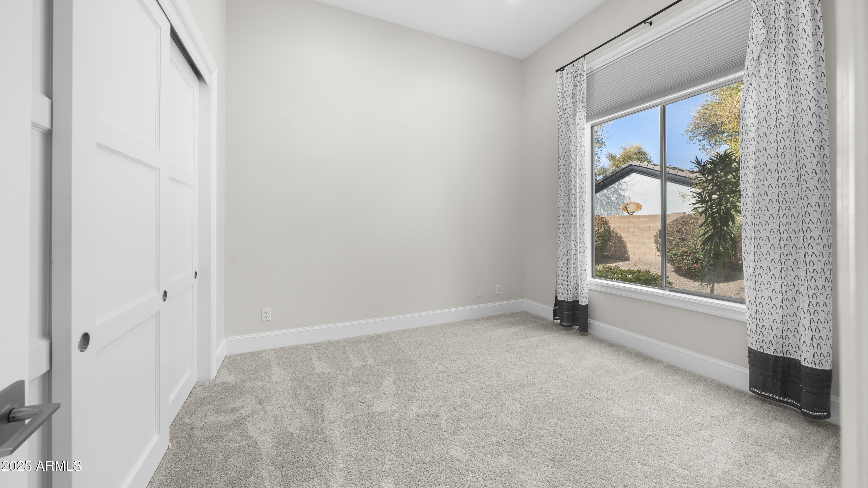 56 South Prairie Road Gilbert, AZ 85296 - Photo 30 of 59 a view of an empty room with a window