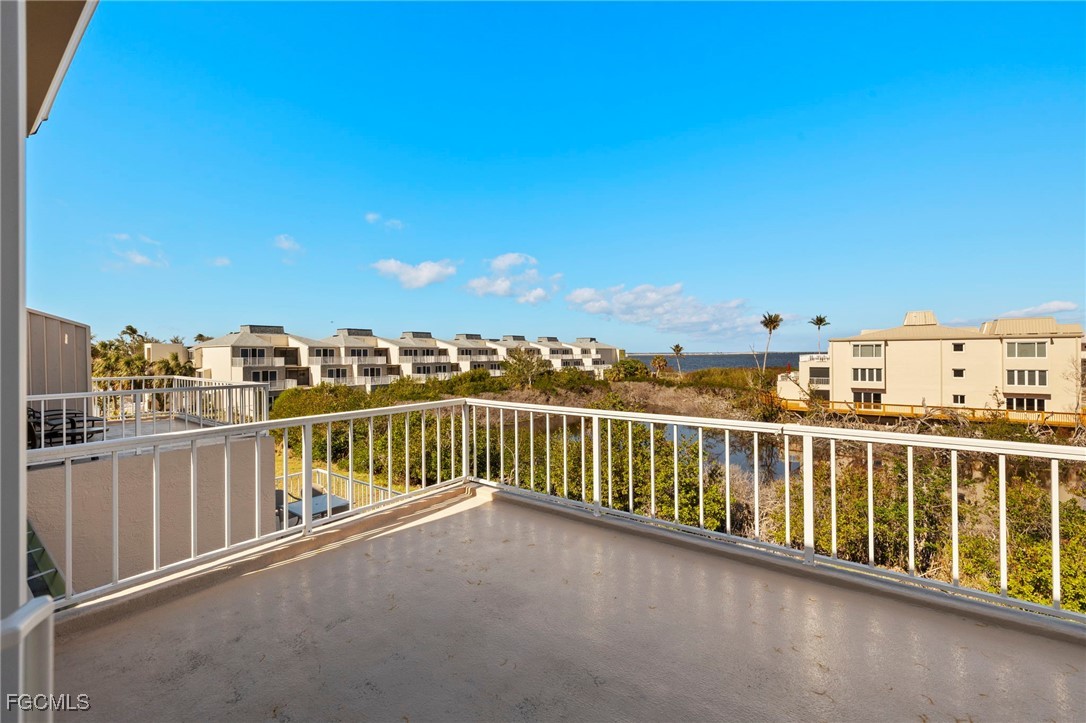 200 Periwinkle Way, Unit 315 Sanibel, FL 33957 - Photo 17 of 33 a view of a balcony with city view