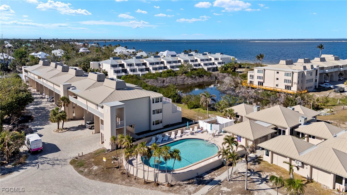 200 Periwinkle Way, Unit 315 Sanibel, FL 33957 - Photo 3 of 33 a view of a terrace with chairs