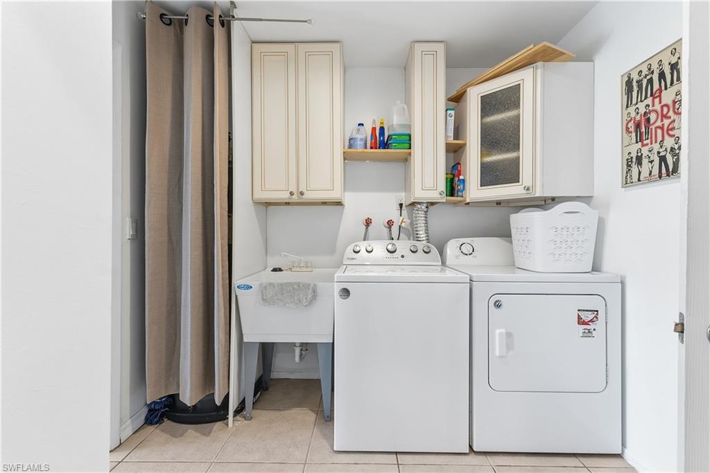 604 110th Avenue North Naples, FL 34108 - Photo 11 of 41 a utility room with dryer and washer