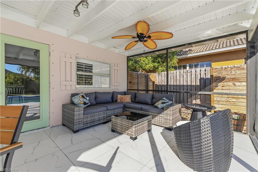 604 110th Avenue North Naples, FL 34108 - Photo 25 of 41 a dining room with furniture and a large window