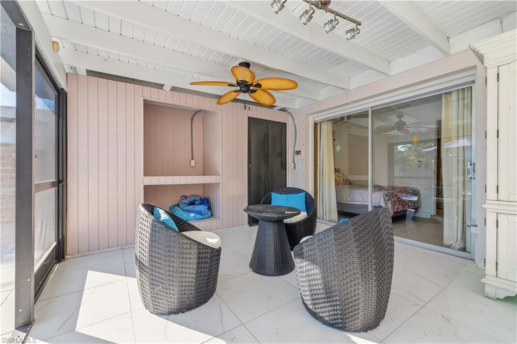 604 110th Avenue North Naples, FL 34108 - Photo 26 of 41 a living room filled with furniture