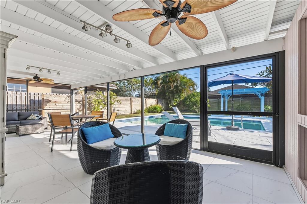 604 110th Avenue North Naples, FL 34108 - Photo 27 of 41 a view of a dining room with furniture window and outside view