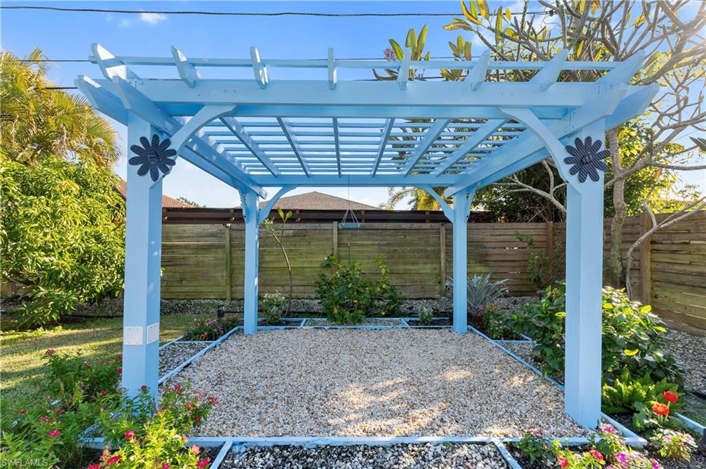 604 110th Avenue North Naples, FL 34108 - Photo 31 of 41 a view of a porch