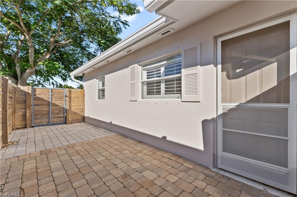 604 110th Avenue North Naples, FL 34108 - Photo 34 of 41 a view of backyard with sitting area