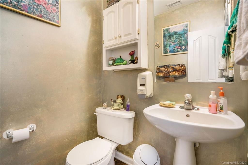 10901 Slalom Hill Road Charlotte, NC 28278 - Photo 17 of 36 a bathroom with a sink and a toilet