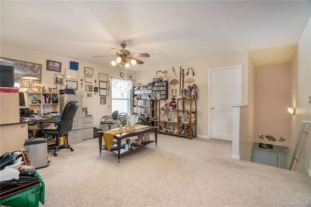 10901 Slalom Hill Road Charlotte, NC 28278 - Photo 26 of 36 a view of a room with gym equipment