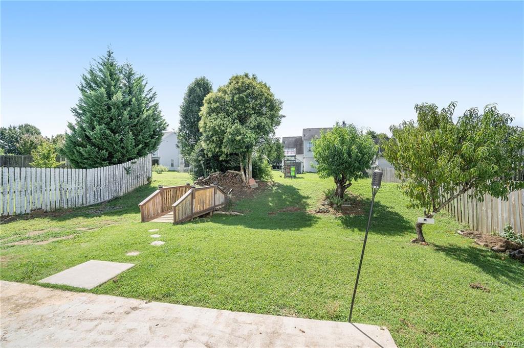 10901 Slalom Hill Road Charlotte, NC 28278 - Photo 36 of 36 a view of a backyard with a slide