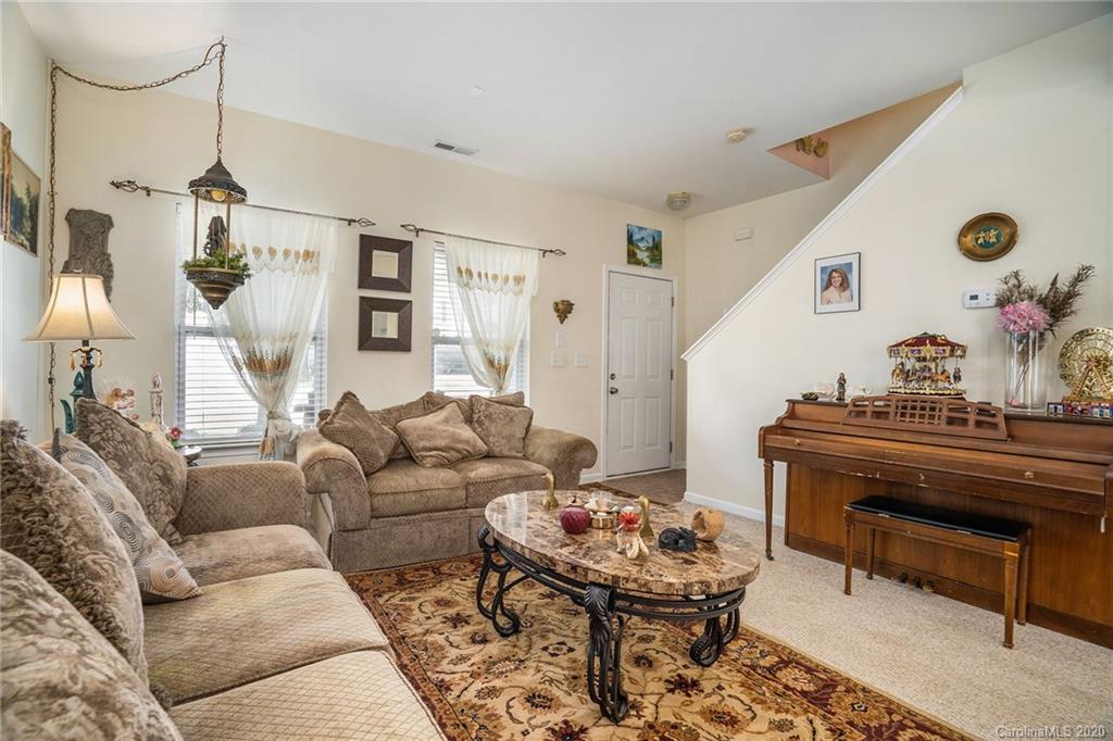 10901 Slalom Hill Road Charlotte, NC 28278 - Photo 6 of 36 a living room with furniture and a large window