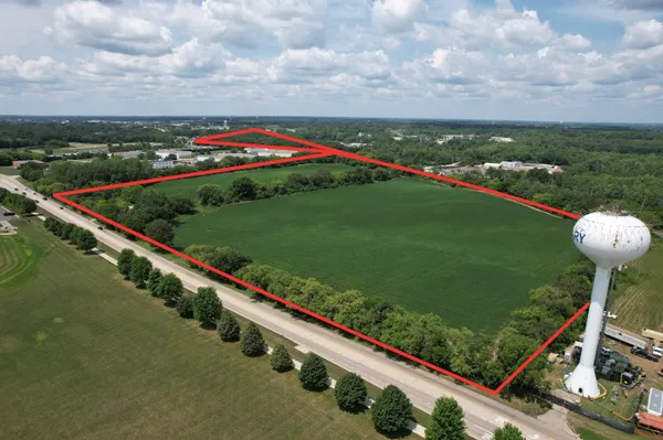 a view of a garden and basketball court