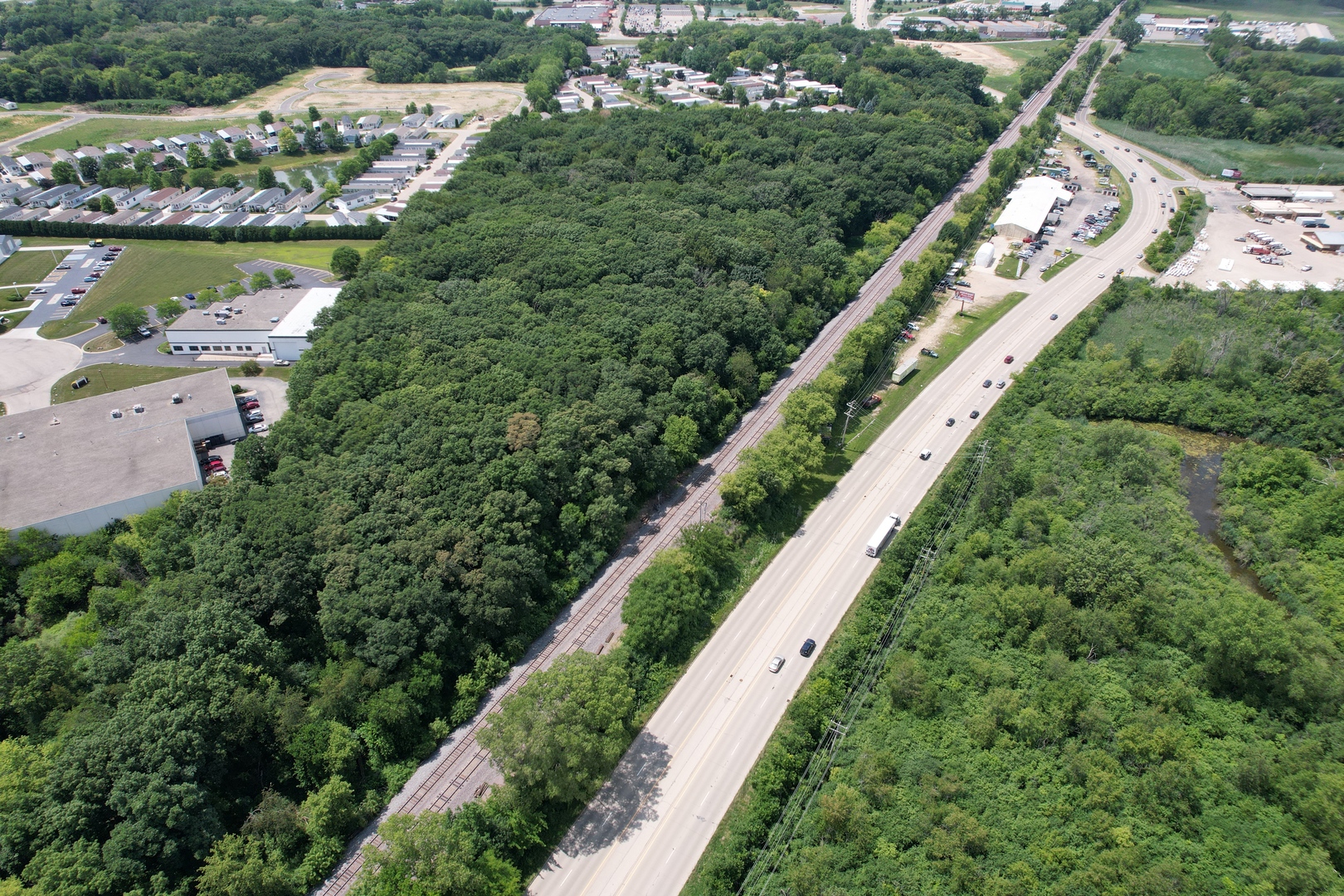 3712 Three Oaks Road Cary, IL 60013 - Photo 6 of 13 an aerial view of a city