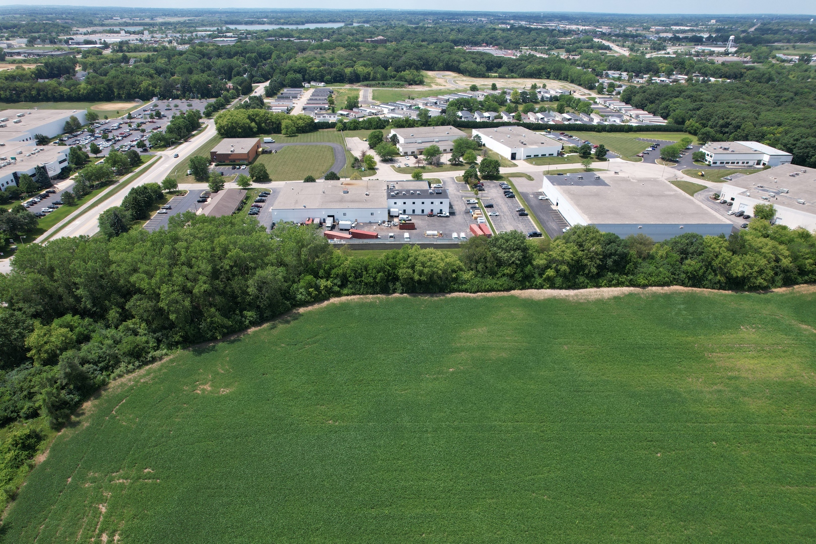 3712 Three Oaks Road Cary, IL 60013 - Photo 9 of 13 an aerial view of residential houses with outdoor space and river view