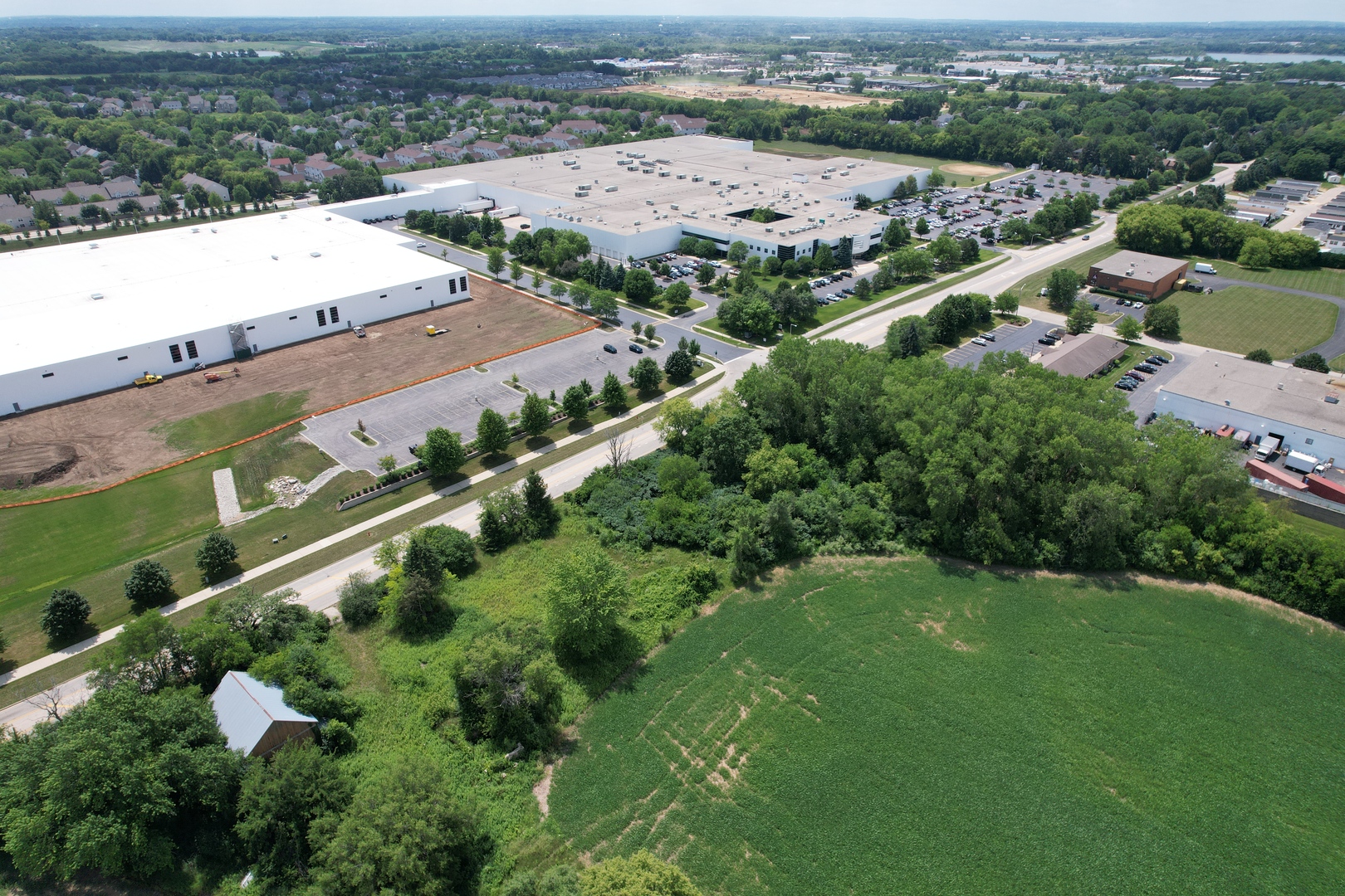 3712 Three Oaks Road Cary, IL 60013 - Photo 10 of 13 an aerial view of a city with lots of residential buildings