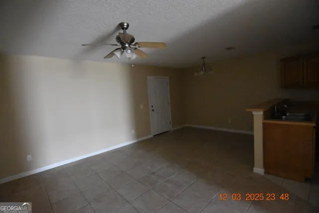 a view of a room with an empty space