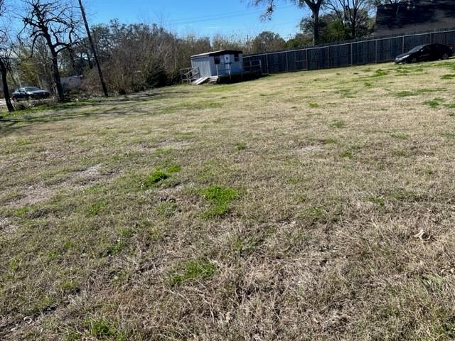 9802 Galveston Road Houston, TX 77034 - Photo 4 of 8 a view of a yard with wooden fence