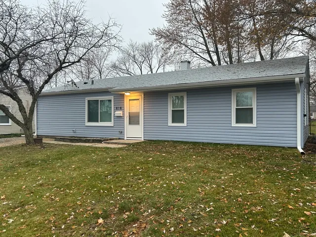 a backyard of a house with lots of green space
