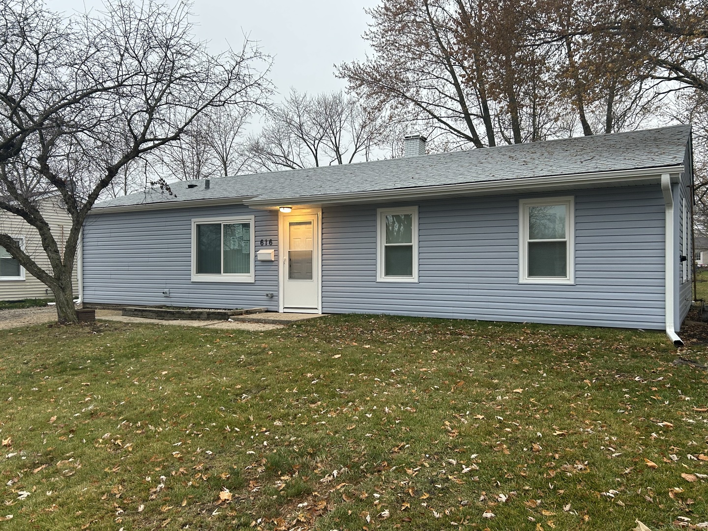 a backyard of a house with lots of green space