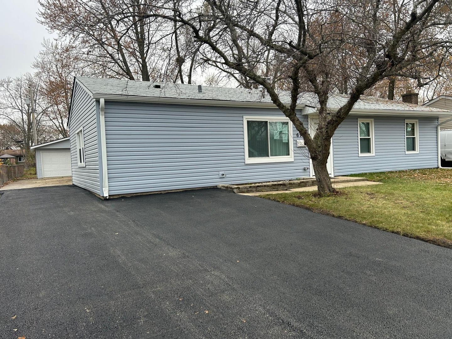 616 Parkside Circle Streamwood, IL 60107 - Photo 2 of 15 a view of a house with a yard