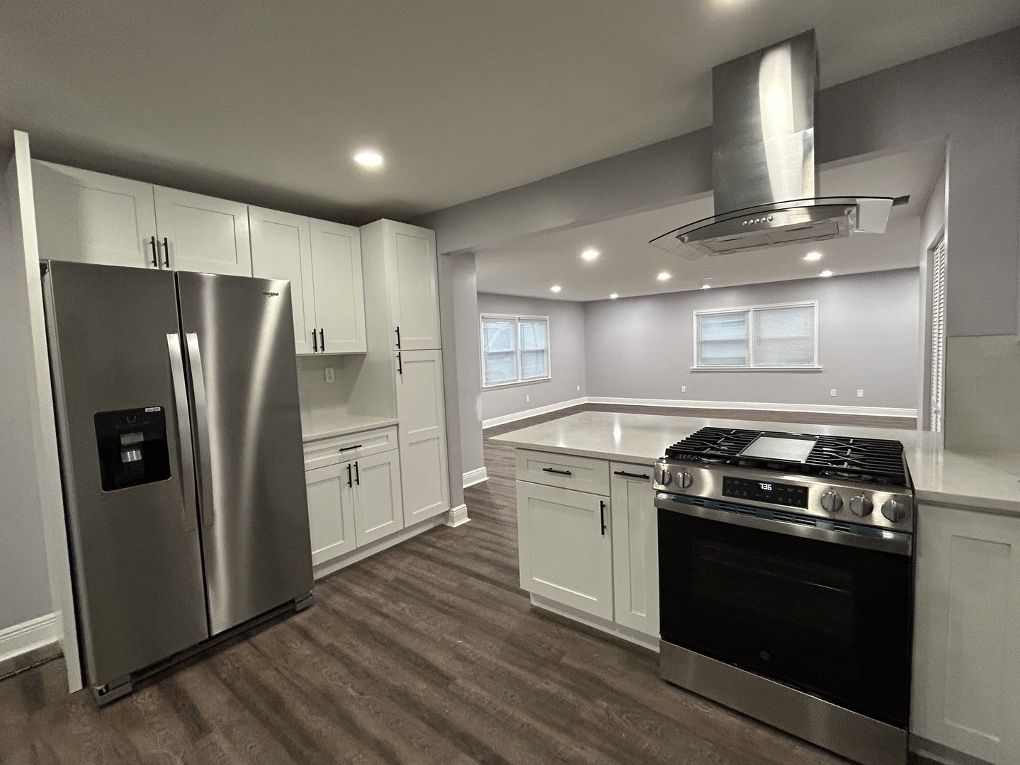 616 Parkside Circle Streamwood, IL 60107 - Photo 7 of 15 a kitchen with a stove and a refrigerator