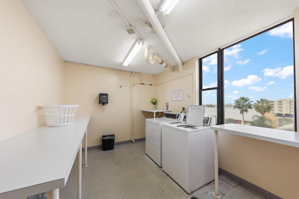 255 Dolphin Point, Unit 508 Clearwater Beach, FL 33767 - Photo 31 of 40 a very nice looking room with a large window