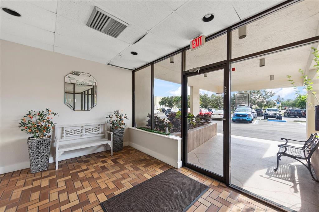 255 Dolphin Point, Unit 508 Clearwater Beach, FL 33767 - Photo 5 of 40 a living room with furniture