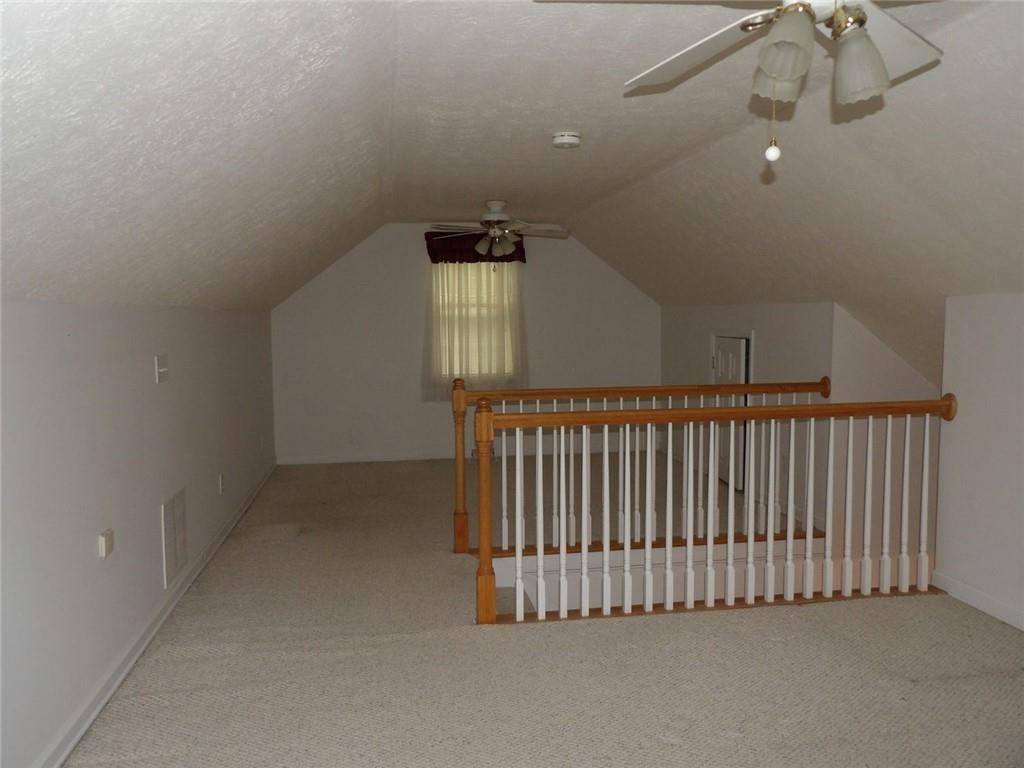676 Graham Road Dallas, GA 30132 - Photo 15 of 19 wooden floor in ceiling room