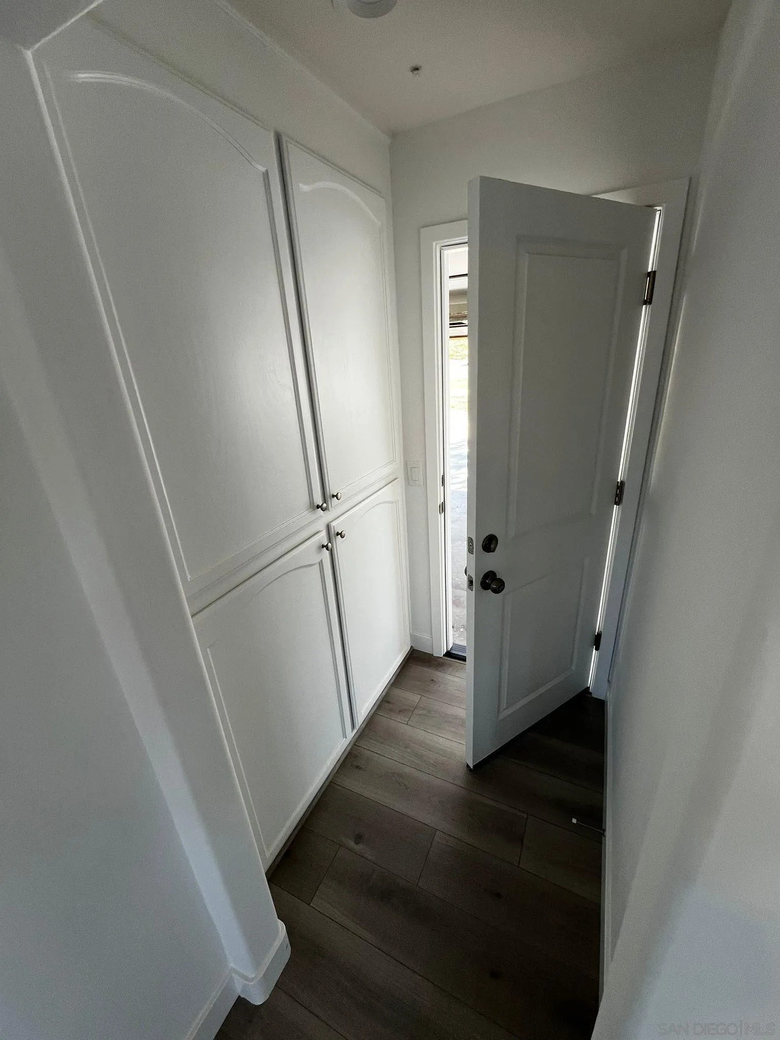 29938 Canadian Honker Road Campo, CA 91906 - Photo 9 of 20 a view of a hallway with wooden floor and staircase