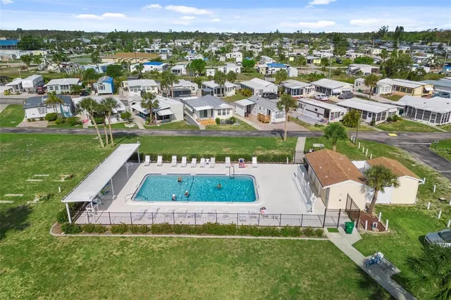 an aerial view of a house with a garden