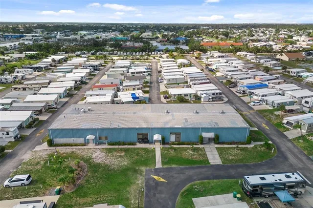 an aerial view of a residential houses with city view and lake view