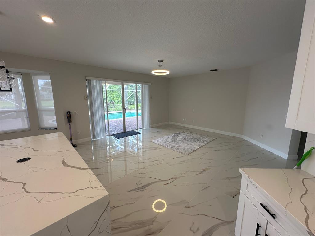 12763 Hyland Circle Boca Raton, FL 33428 - Photo 5 of 10 a view of a kitchen cabinets