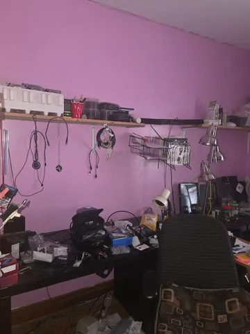 a view of a workspace with sitting area