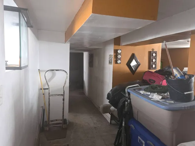 a table and chairs in a room