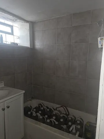 a bathroom with a toilet and a sink