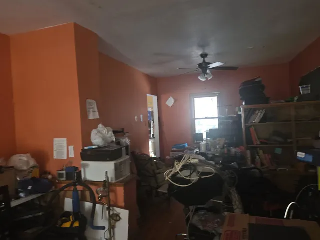 a view of a workspace with furniture