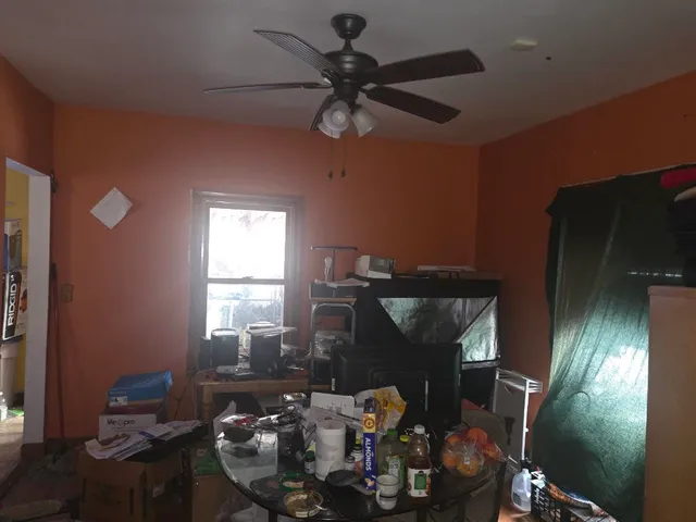 a room with furniture and chandelier