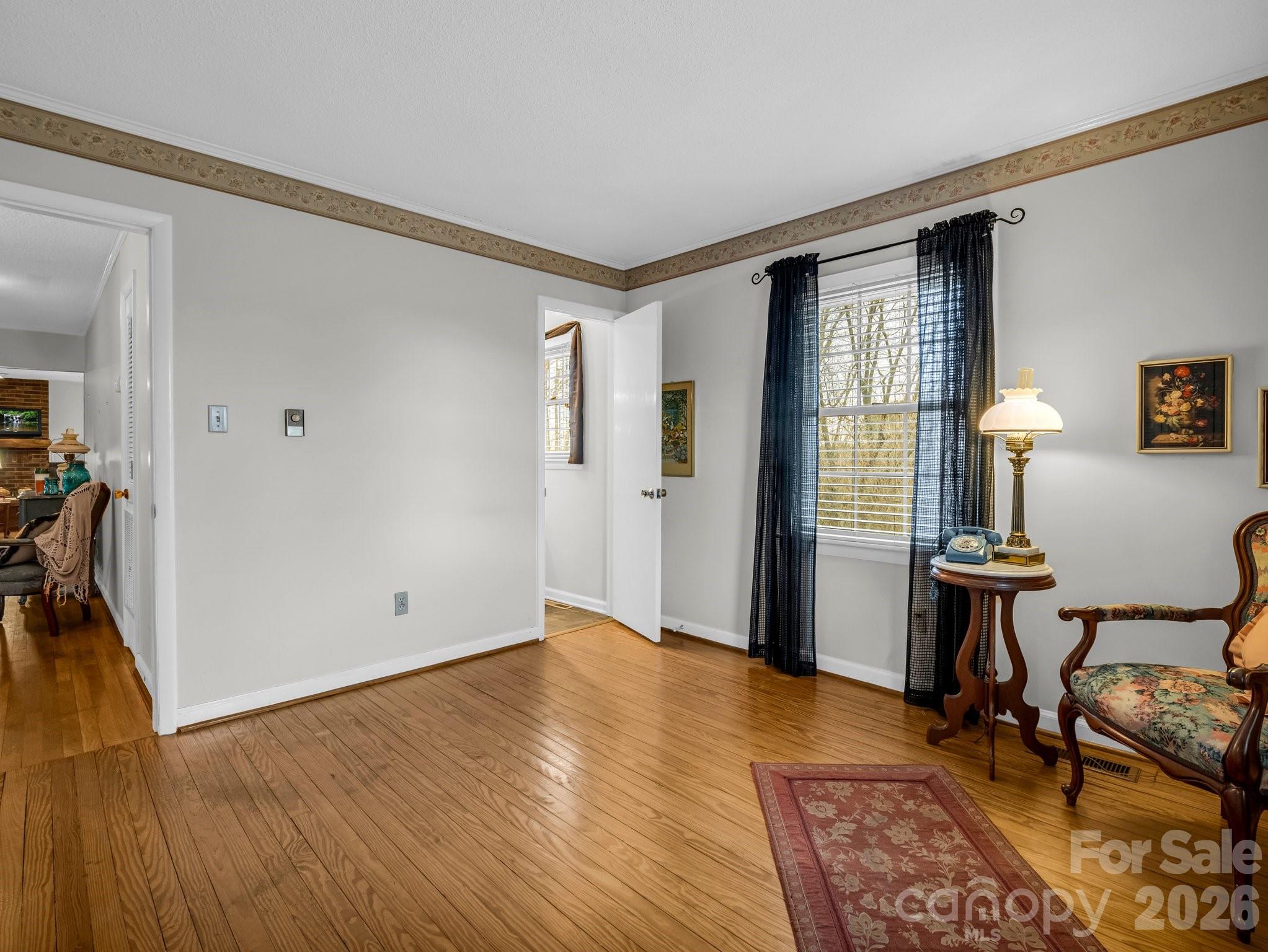 7392 Reeps Grove Church Road Vale, NC 28168 - Photo 17 of 30 a view of room with furniture and wooden floor