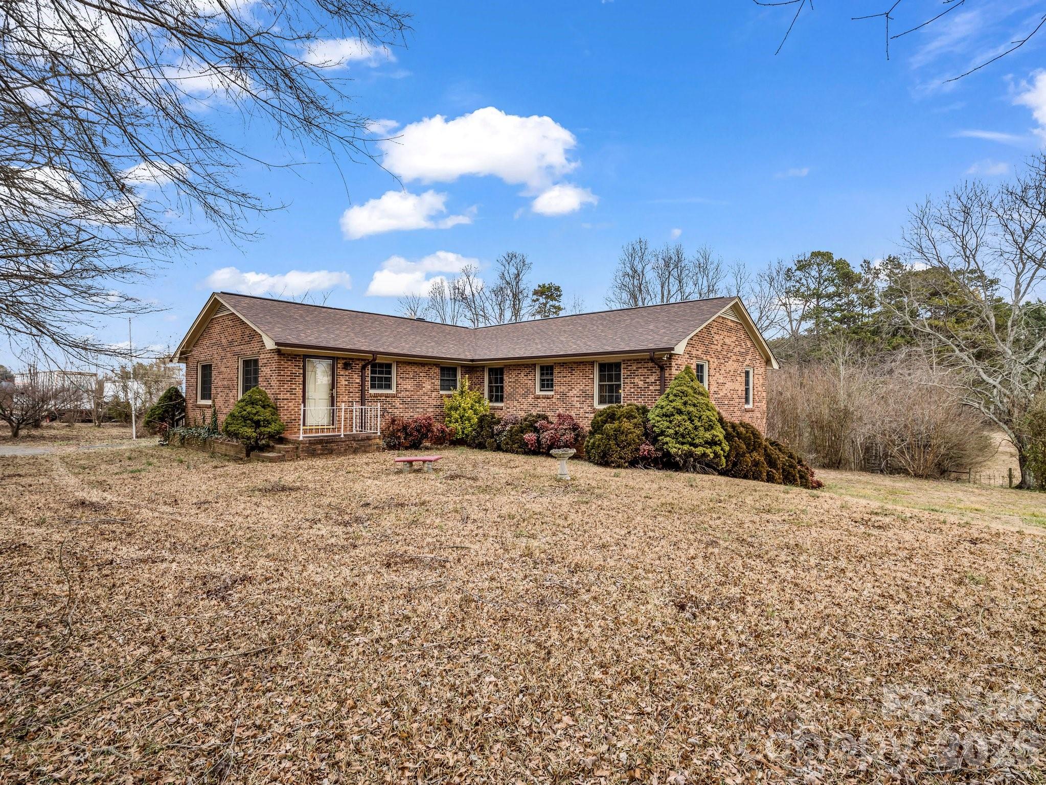 7392 Reeps Grove Church Road Vale, NC 28168 - Photo 2 of 30 a front view of a house with a yard