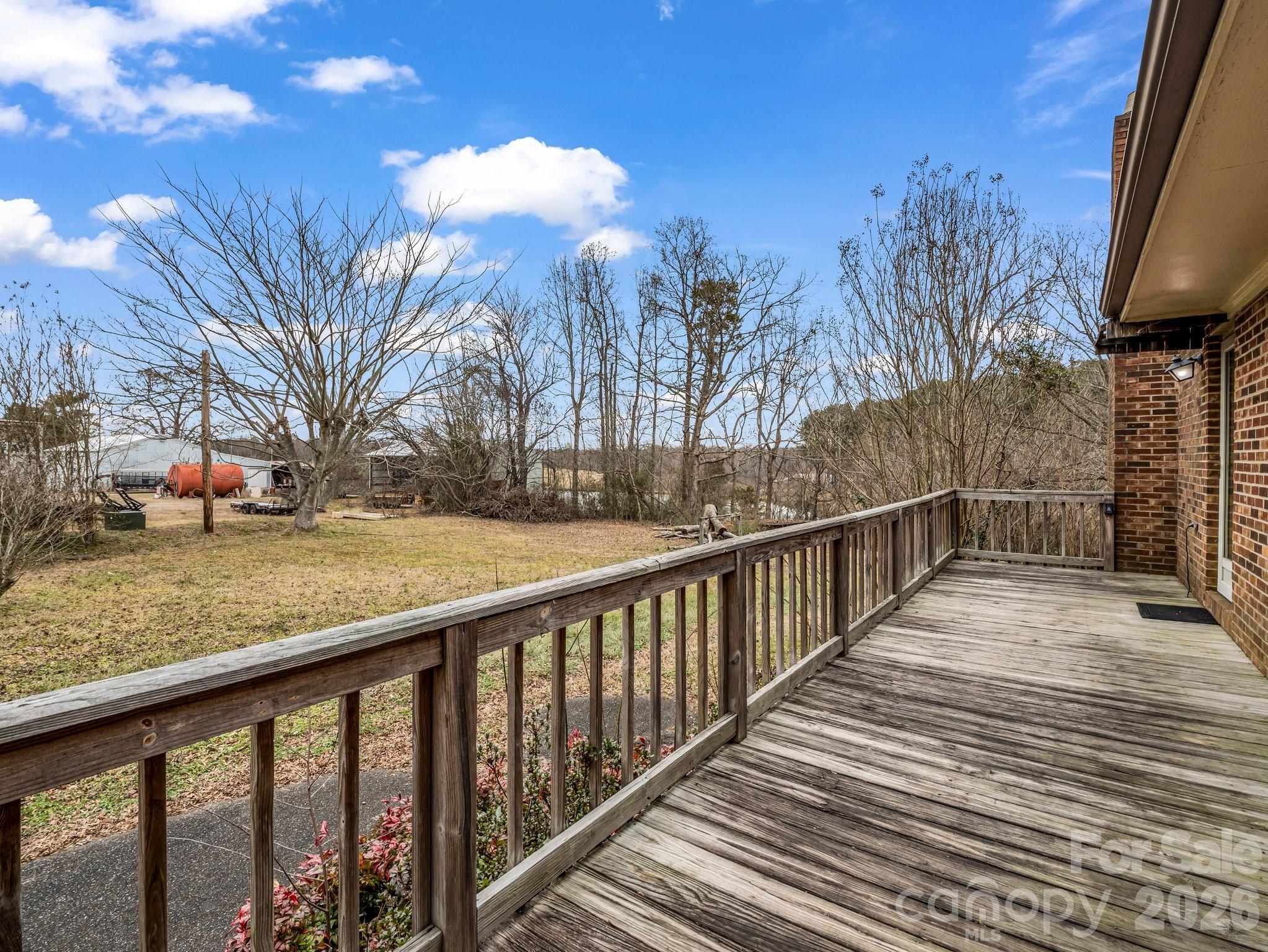 7392 Reeps Grove Church Road Vale, NC 28168 - Photo 28 of 30 a view of balcony with wooden floor and fence