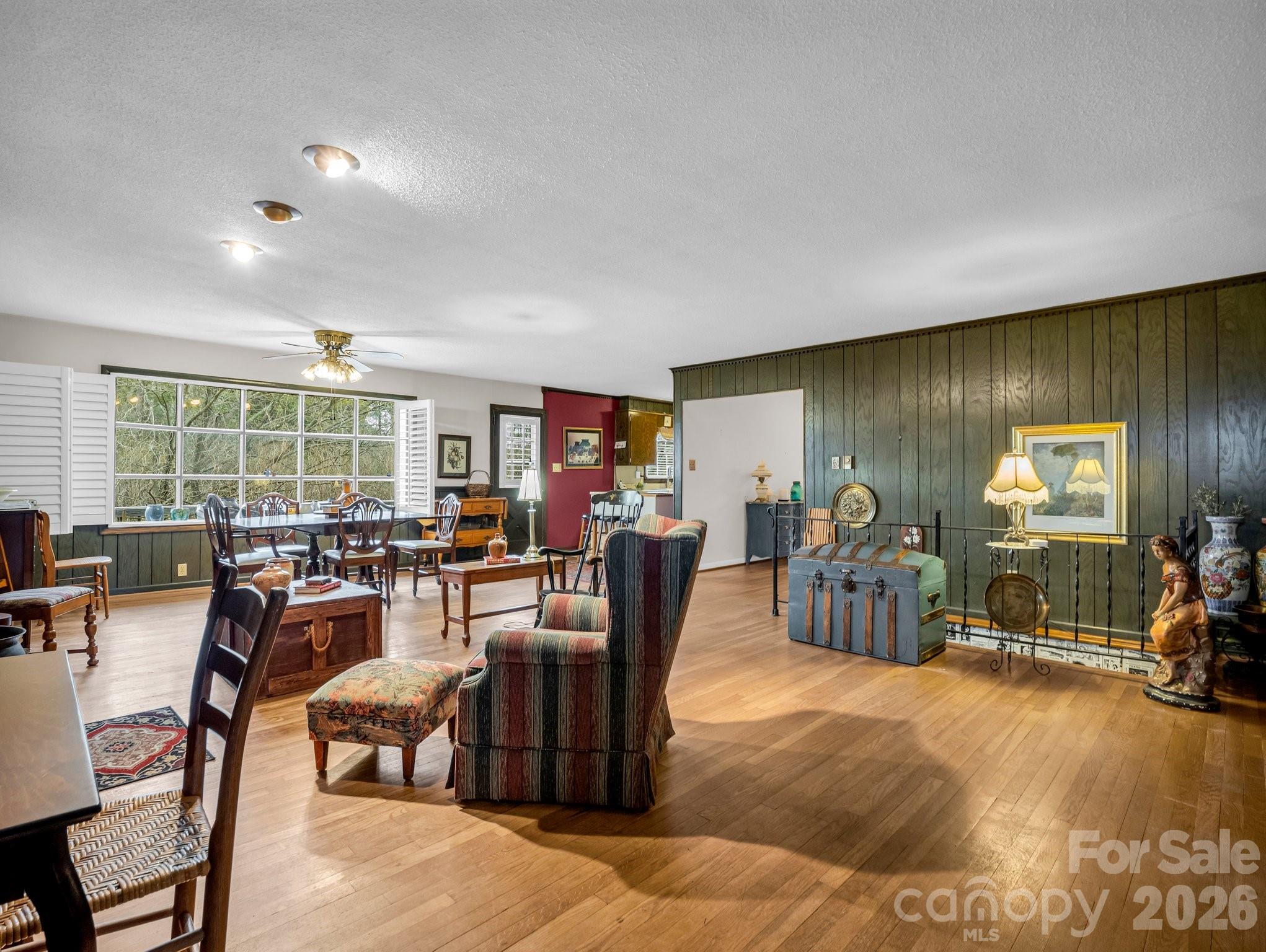 7392 Reeps Grove Church Road Vale, NC 28168 - Photo 7 of 30 a living room with furniture a window and gym equipment