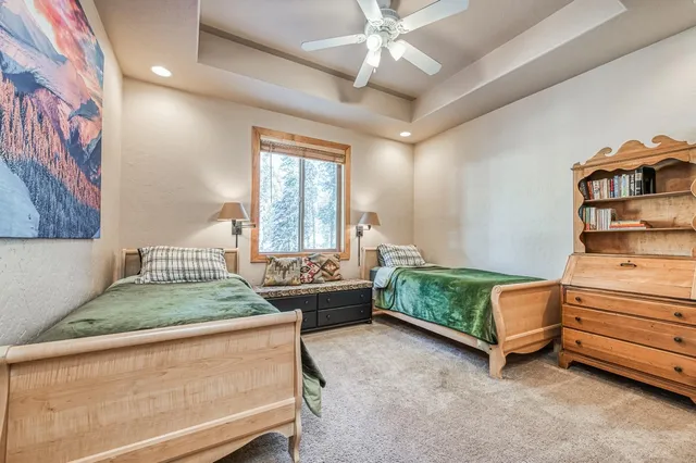 a spacious bathroom with a tub and shower