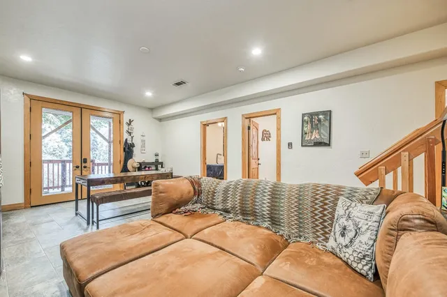 a view of a porch with wooden floor and outdoor space